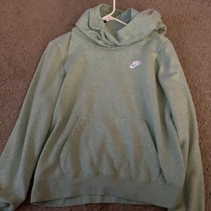 Green hooded Nike sweatshirt